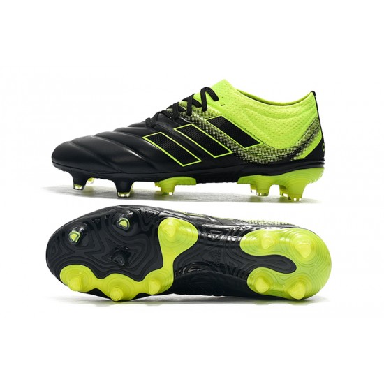 dark green football boots